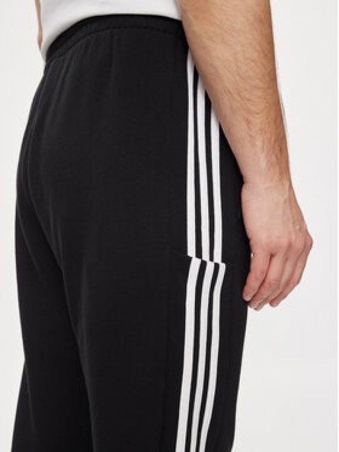 adidas Spodnie dresowe Essentials French Terry Tapered Cuff 3-Stripes Joggers HA4337 Czarny Regular Fit