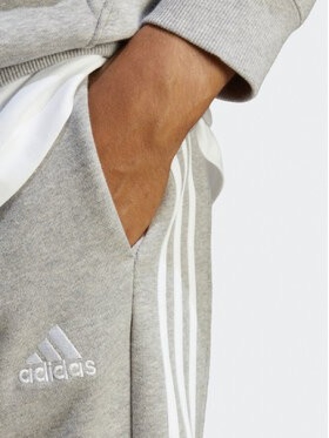 adidas Spodnie dresowe Essentials French Terry Tapered Cuff 3-Stripes Joggers IC9407 Szary Regular Fit