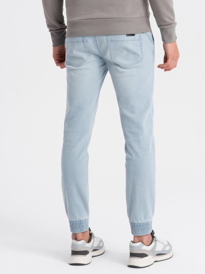 Męskie spodnie jeansowe JOGGERY z przetarciami - jasnoniebieskie V1 OM-PADJ-0150 - XXL