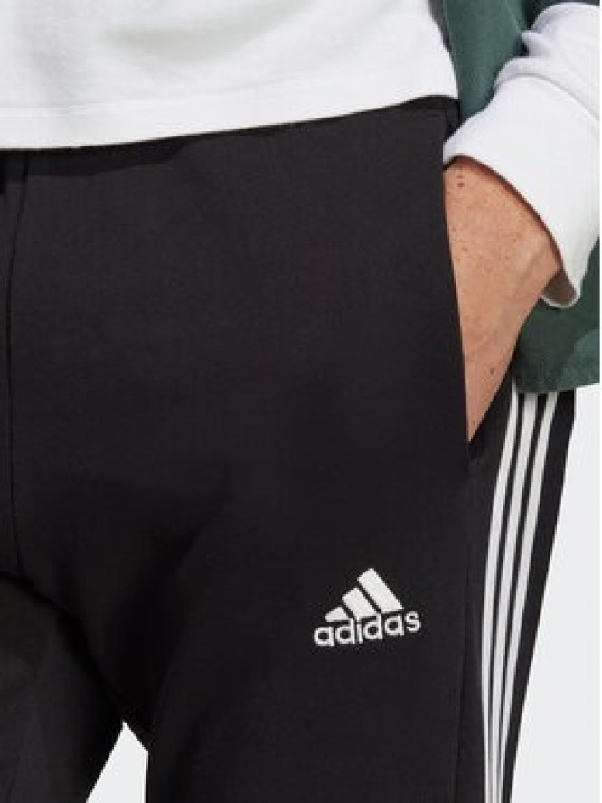 adidas Spodnie dresowe Essentials French Terry Tapered Elastic Cuff 3-Stripes Joggers IC0050 Czarny Regular Fit