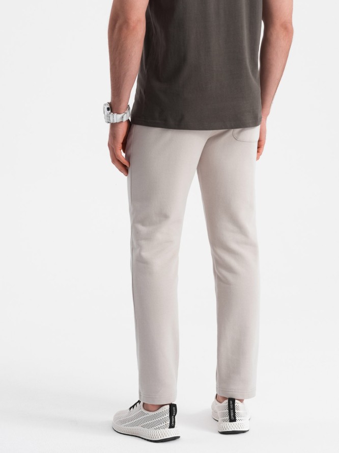 Męskie spodnie dresowe z nogawką bez ściągacza - jasnobeżowe V1 OM-PABS-0206 - XXL