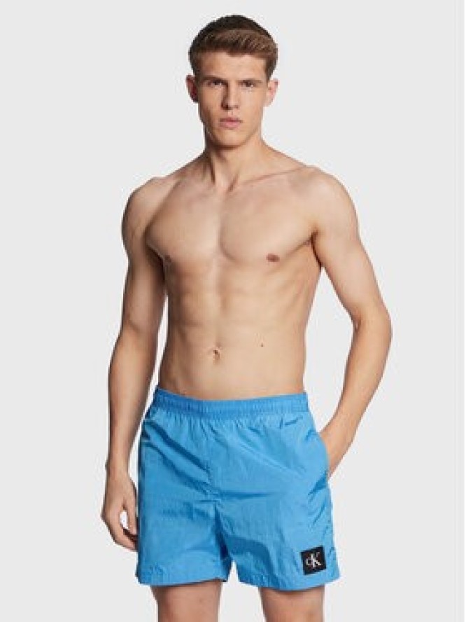 Calvin Klein Swimwear Szorty kąpielowe KM0KM00819 Niebieski Regular Fit