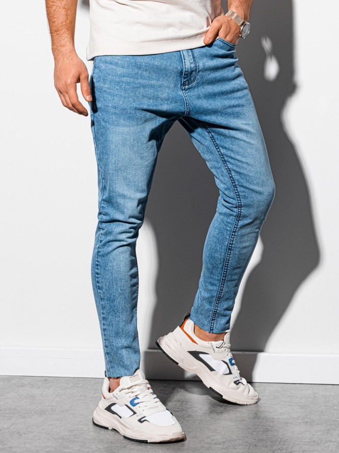 Spodnie męskie jeansowe marmurkowe z surowo wykończoną nogawką SLIM FIT - jasnoniebieskie V2 OM-PADP-0146 - S