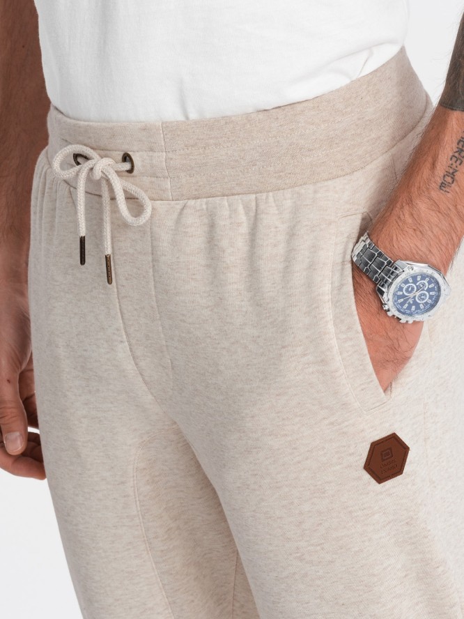 Spodnie męskie dresowe z przyjemnej dzianiny - kremowy melanż V1 OM-PASK-0131 - XL