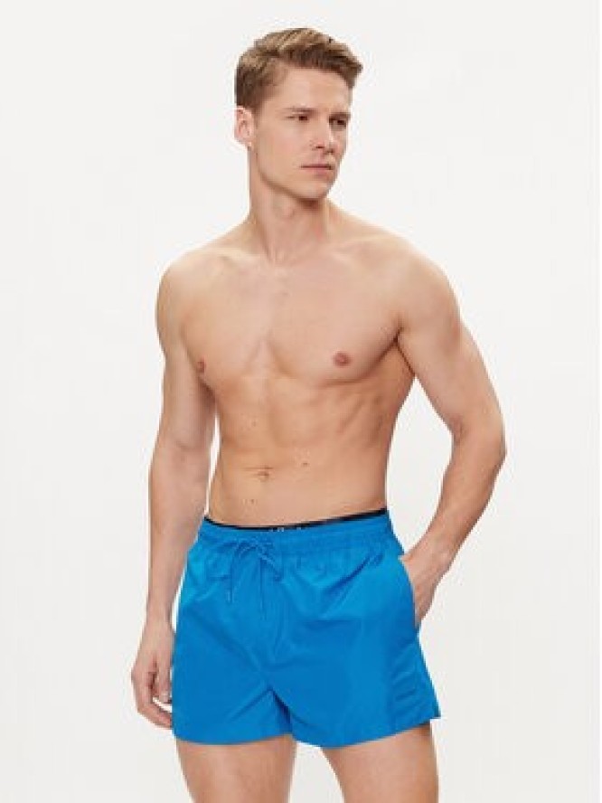 Calvin Klein Swimwear Szorty kąpielowe KM0KM00947 Niebieski Regular Fit