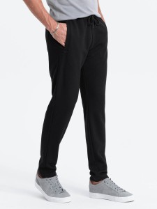 Męskie spodnie dresowe o marchewkowym kroju - czarne V1 OM-PASK-0166 - XXL