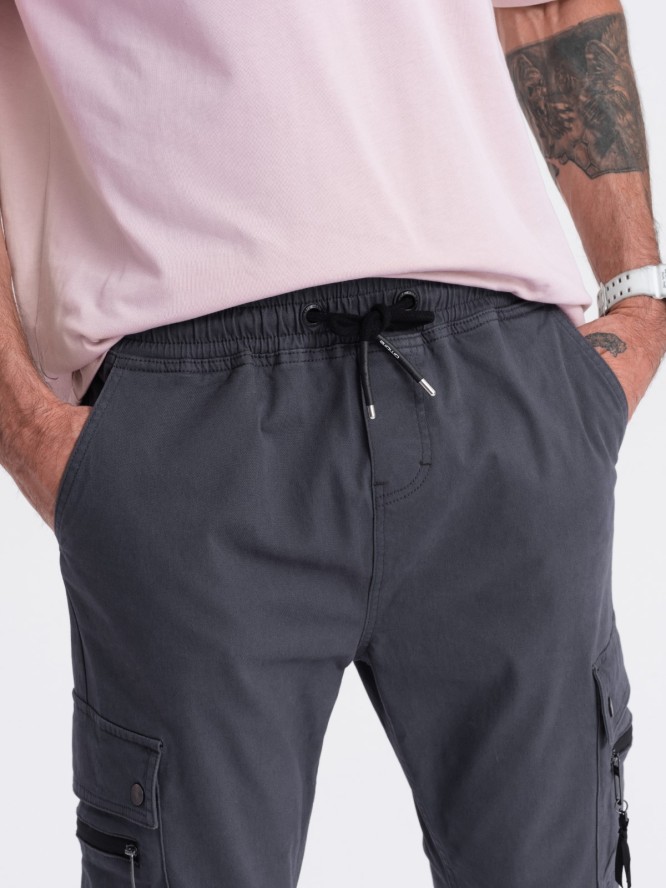 Męskie spodnie JOGGERY z zapinanymi kieszeniami cargo - grafitowe V3 OM-PAJO-0125 - XXL