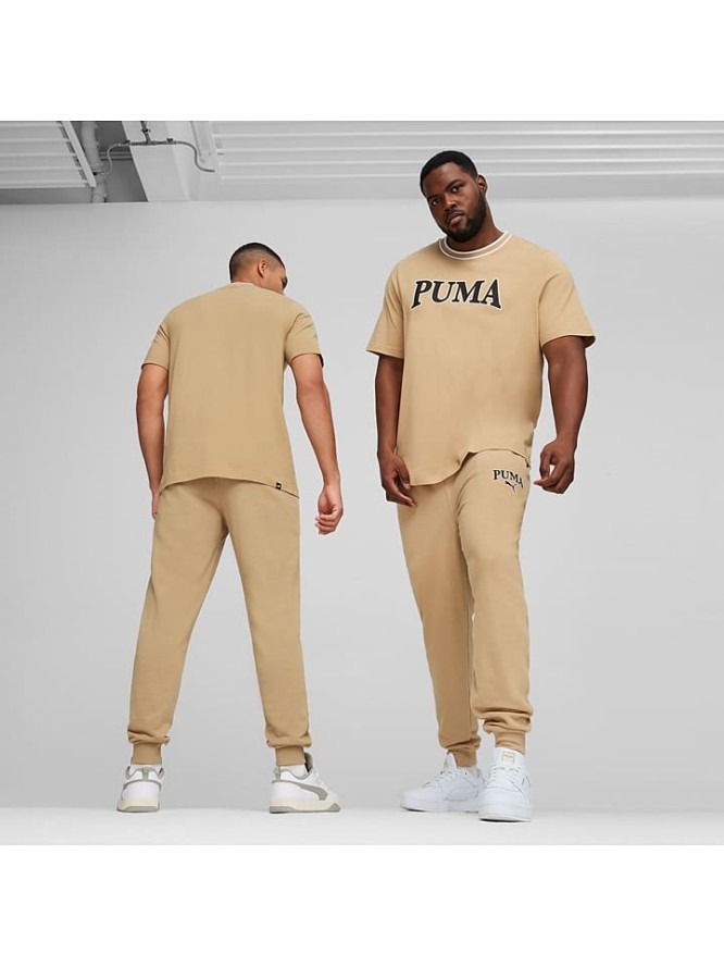 Puma Spodnie dresowe "Squad" w kolorze beżowym rozmiar: M