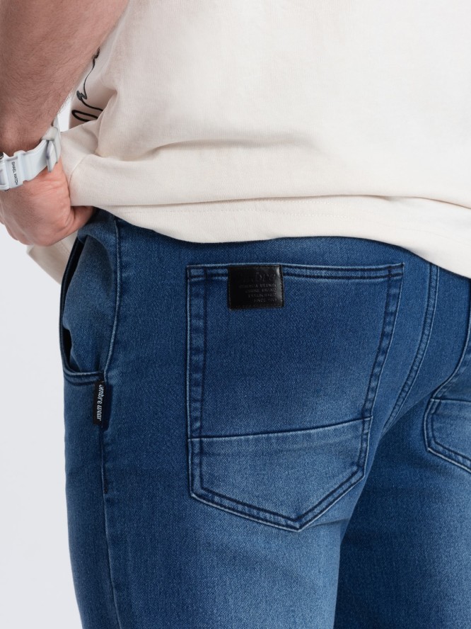 Spodnie męskie jeansowe JOGGER SLIM FIT - ciemnoniebieskie V3 OM-PADJ-0134 - XXL