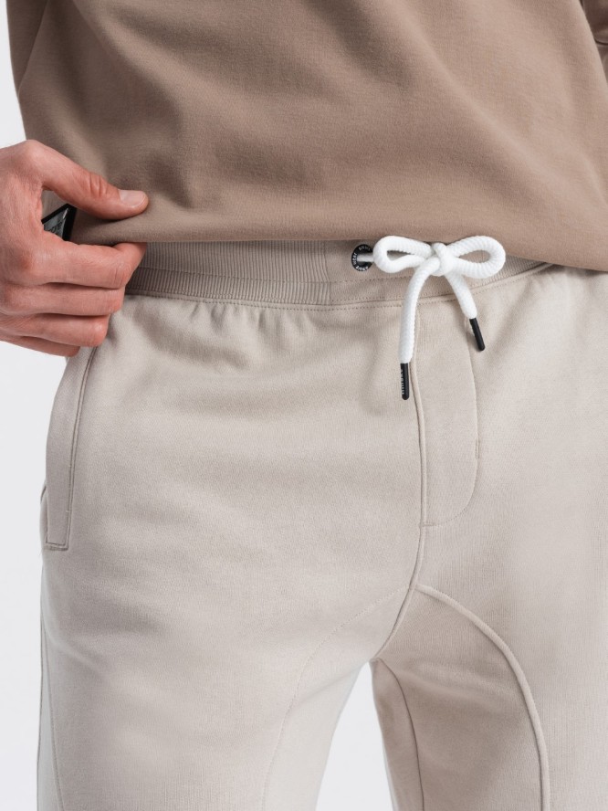 Spodnie męskie dresowe typu jogger - jasnobeżowe V1 OM-PABS-0173 - XXL