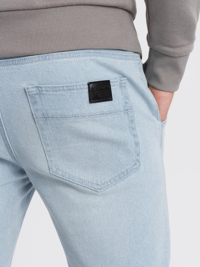 Męskie spodnie jeansowe JOGGERY z przetarciami - jasnoniebieskie V1 OM-PADJ-0150 - XXL