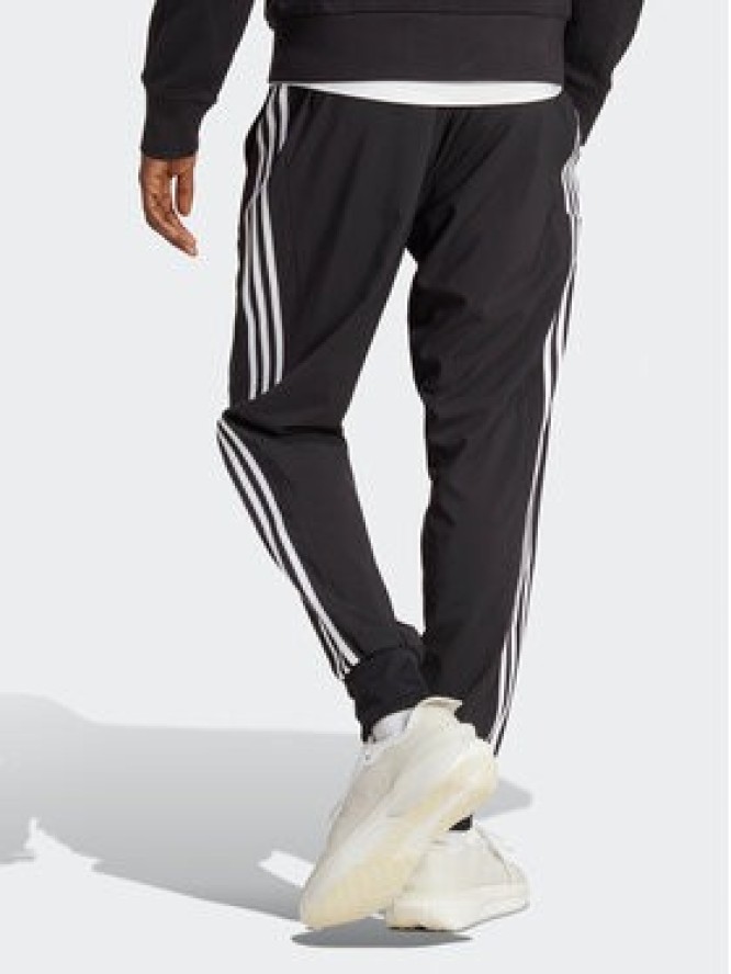 adidas Spodnie dresowe AEROREADY Essentials Tapered Cuff Woven 3-Stripes Joggers IC0041 Czarny Regular Fit