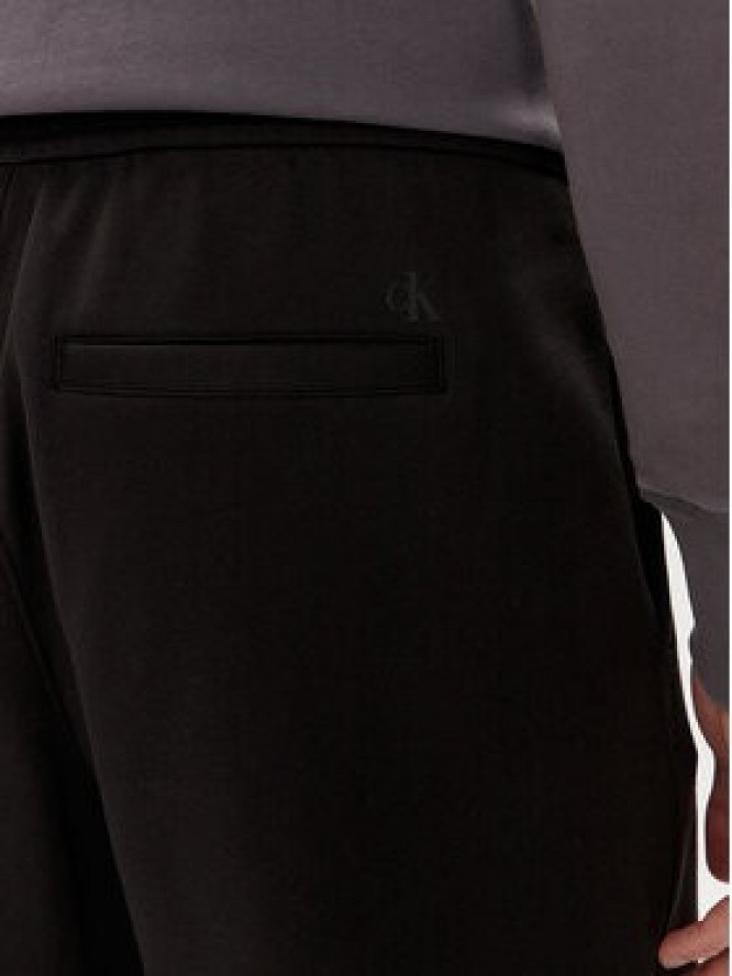 Calvin Klein Jeans Szorty sportowe Logo Repeat J30J325129 Czarny Regular Fit