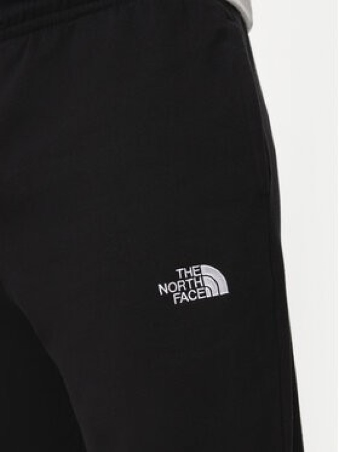 The North Face Spodnie dresowe Essential NF0A8A6J Czarny Relaxed Fit