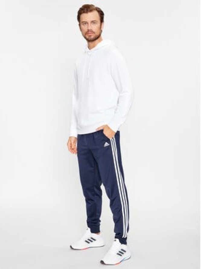 adidas Spodnie dresowe Essentials Warm-Up 3-Stripes H46106 Granatowy Regular Fit