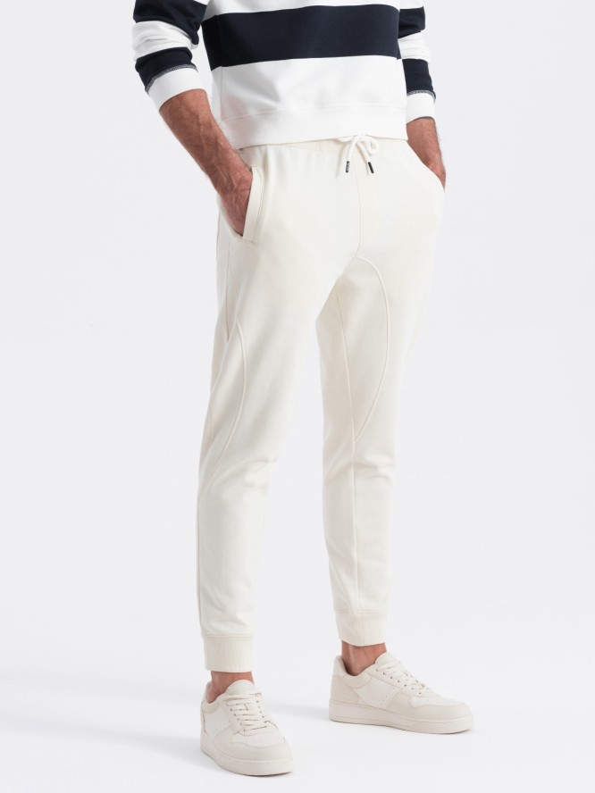 Męskie spodnie dresowe typu jogger - kremowe V11 OM-PABS-0173 - XXL