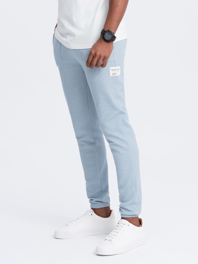 Spodnie męskie dresowe ze strukturalnej dzianiny - jasnoniebieskie V4 OM-PASK-0211 - XXL