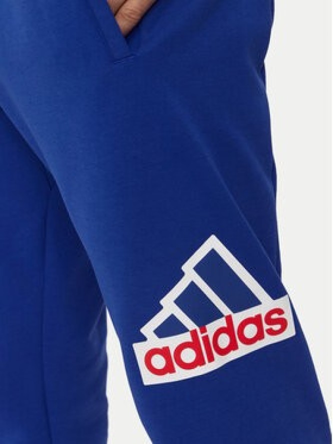 adidas Spodnie dresowe Future Icons Badge of Sport IS9594 Niebieski Regular Fit