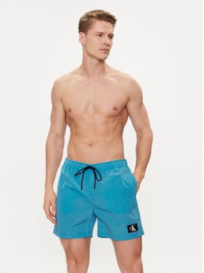 Calvin Klein Swimwear Szorty kąpielowe KM0KM00980 Niebieski Regular Fit