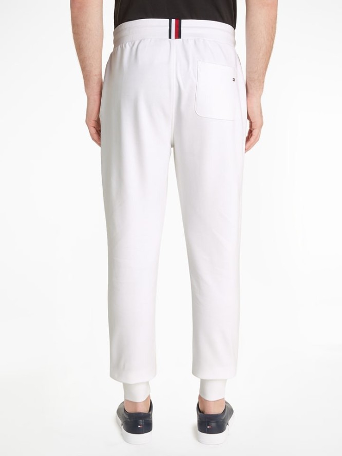 Tommy Hilfiger Spodnie dresowe w kolorze białym rozmiar: L