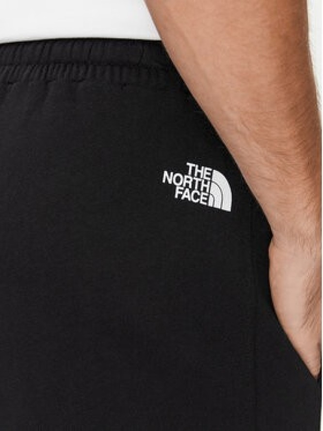 The North Face Spodnie dresowe Standard NF0A4M7L Czarny Regular Fit