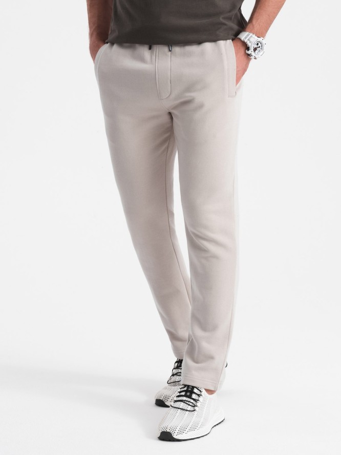 Męskie spodnie dresowe z nogawką bez ściągacza - jasnobeżowe V1 OM-PABS-0206 - XXL