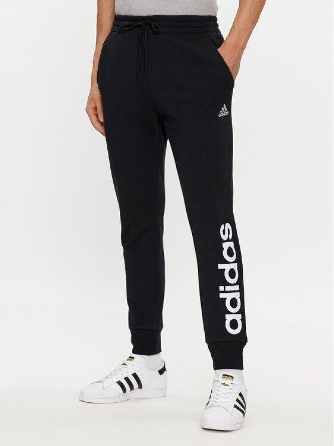 adidas Spodnie dresowe Essentials French Terry Tapered Cuff Logo Joggers IC0063 Czarny Regular Fit