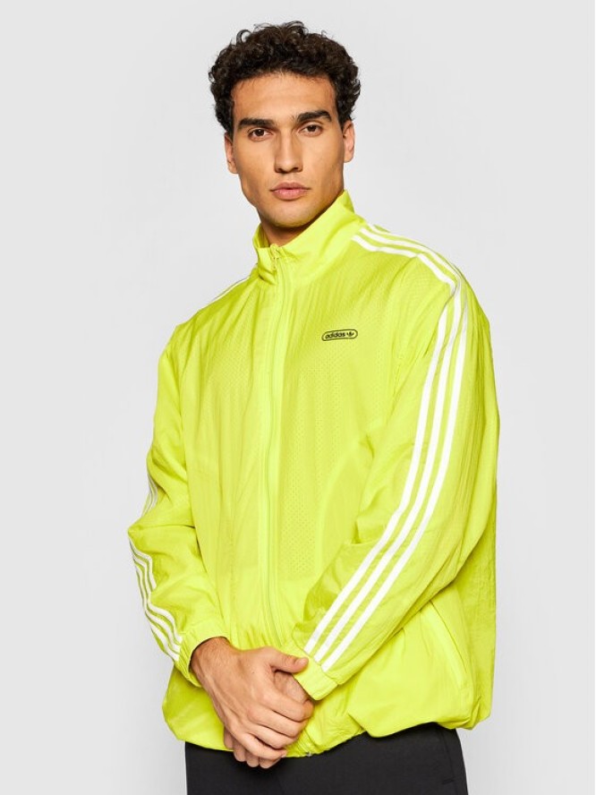 adidas Kurtka przejściowa Reverse Track GN3818 Żółty Regular Fit