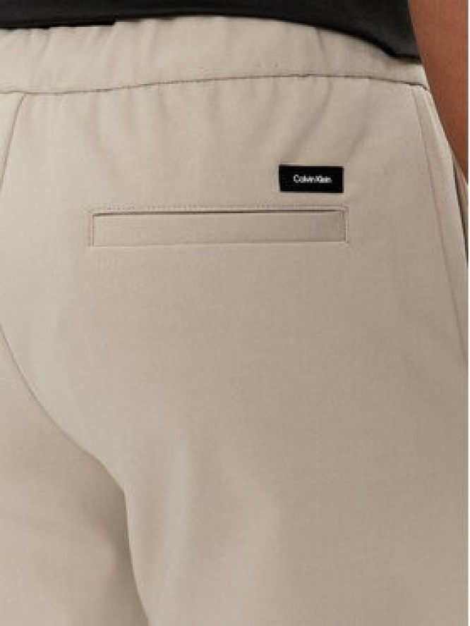 Calvin Klein Spodnie materiałowe K10K113647 Beżowy Comfort Fit