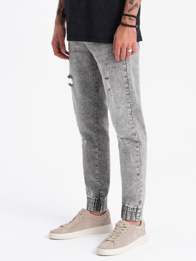 Spodnie męskie JOGGERY jeansowe z przetarciami - jasnoszare V4 OM-PADJ-0150 - XXL