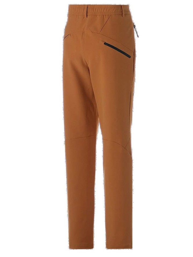 Puma Spodnie funkcyjne "RainCell" w kolorze jasnobrązowym rozmiar: S