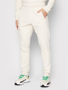 adidas Spodnie dresowe adicolor Essentials HE9410 Beżowy Slim Fit