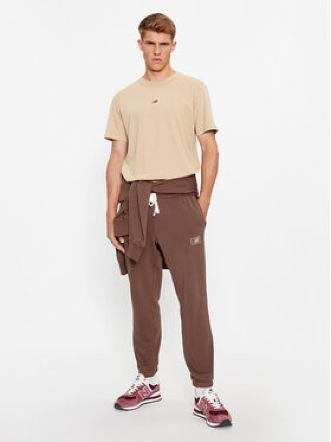 New Balance Spodnie dresowe NB Essentials Sweatpant MP33509 Brązowy Regular Fit