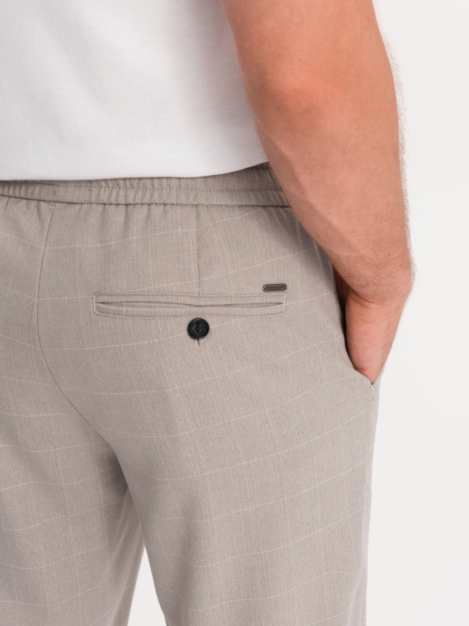 Spodnie męskie w kratkę z gumką w pasie - jasnoszare V1 OM-PACP-0122 - XL