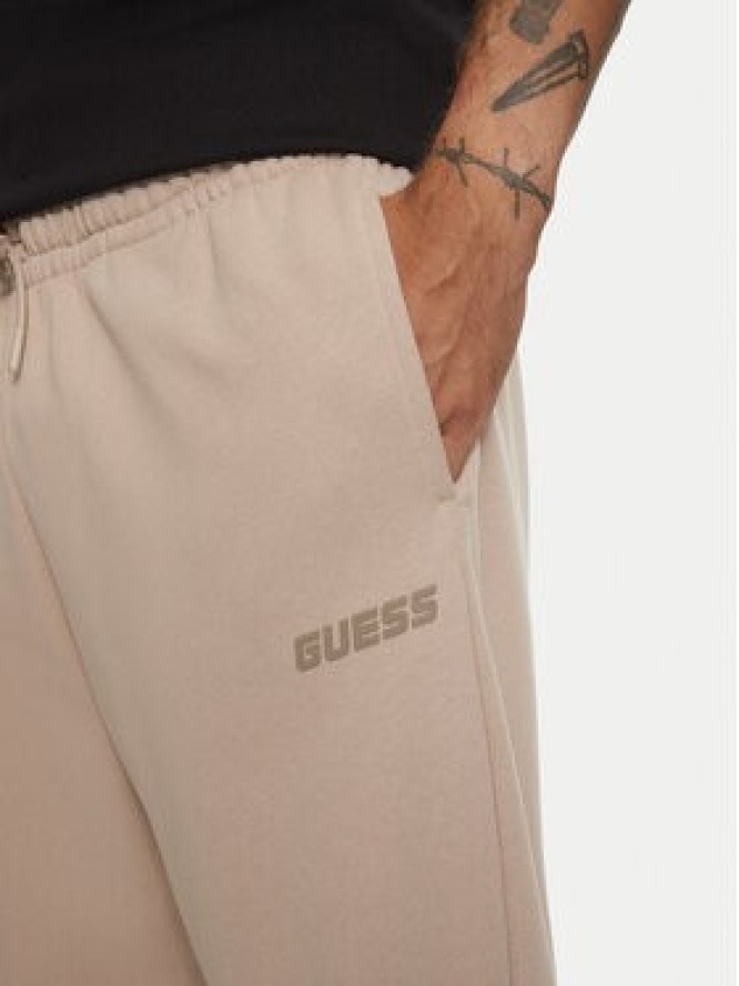 Guess Spodnie dresowe Emis Z4YB00 KAIJ1 Beżowy Relaxed Fit