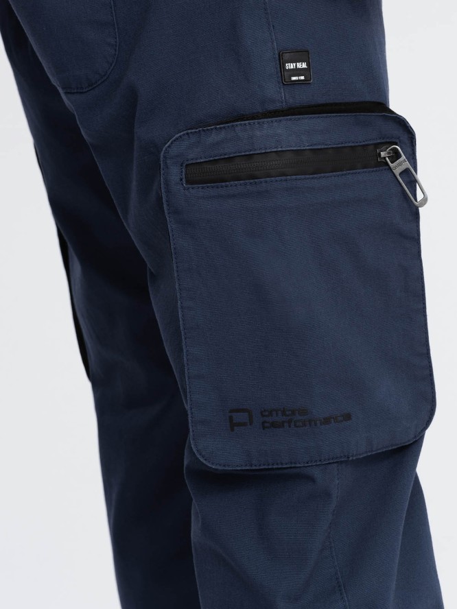 Męskie spodnie JOGGERY z zapinanymi kieszeniami cargo - granatowe V5 OM-PAJO-0135 - XXL