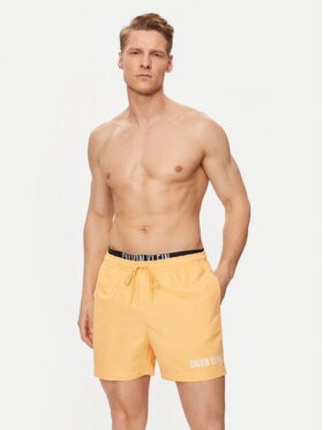 Calvin Klein Swimwear Szorty kąpielowe KM0KM00992 Pomarańczowy Regular Fit
