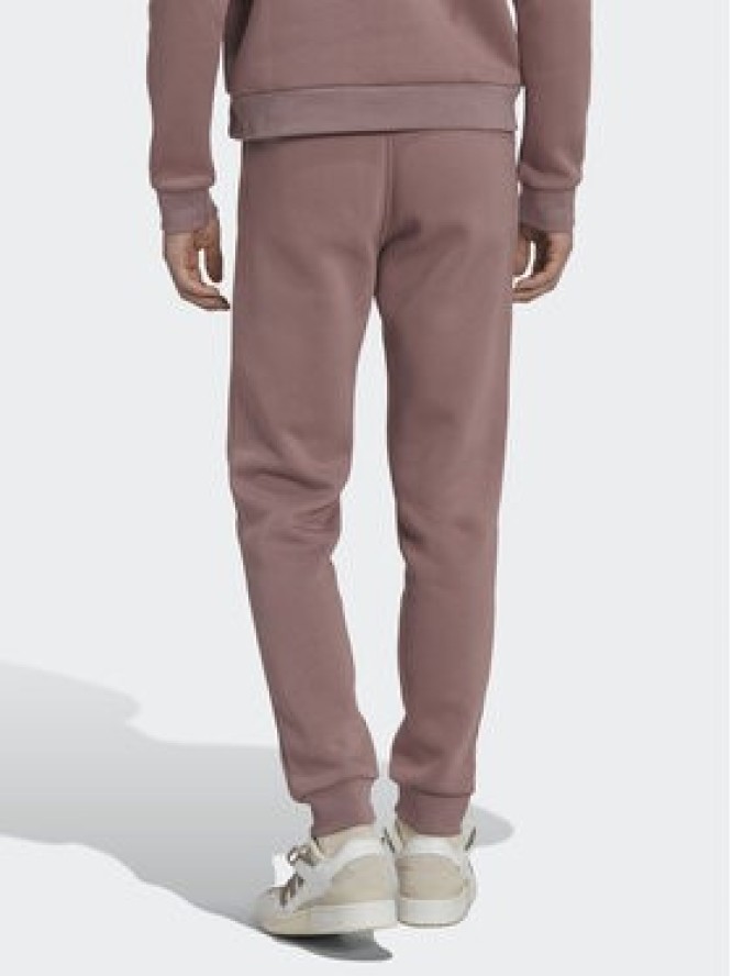 adidas Spodnie dresowe adicolor Essentials Trefoil HK0105 Różowy Slim Fit