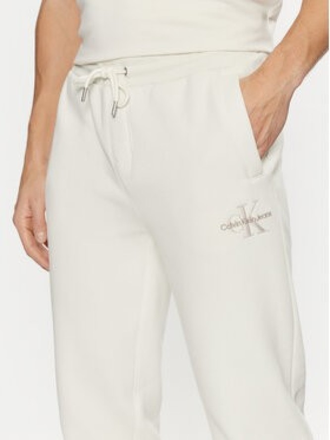 Calvin Klein Jeans Spodnie dresowe Monologo Hwk Pant J30J325658 Écru Regular Fit