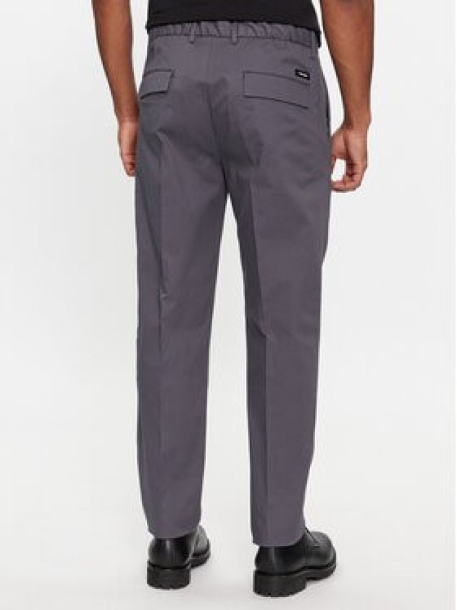 Calvin Klein Spodnie garniturowe Modern Twill Tapered Pleat K10K111490 Szary Slim Fit