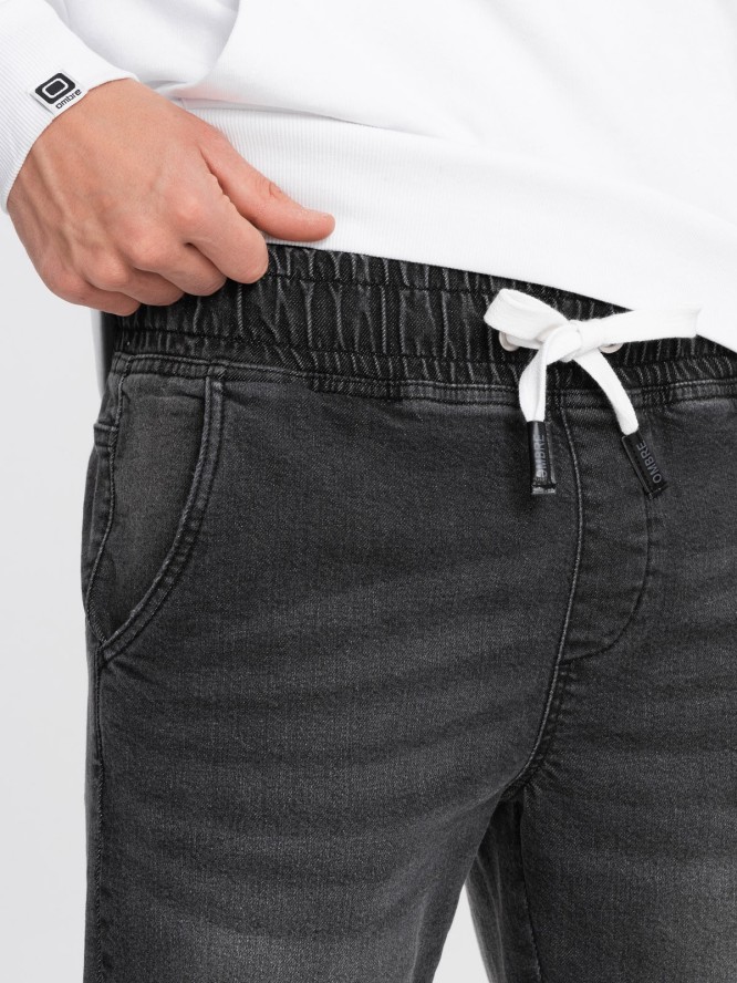 Męskie spodnie jeansowe JOGGERY z przetarciami - czarne V2 OM-PADJ-0150 - XXL