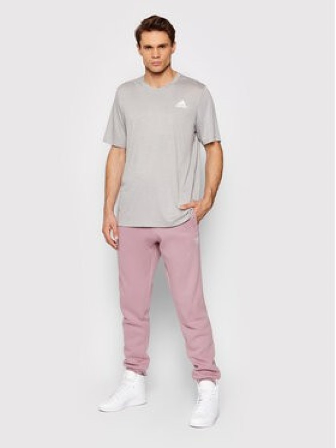 adidas Spodnie dresowe adicolor Essentials HE9411 Fioletowy Slim Fit