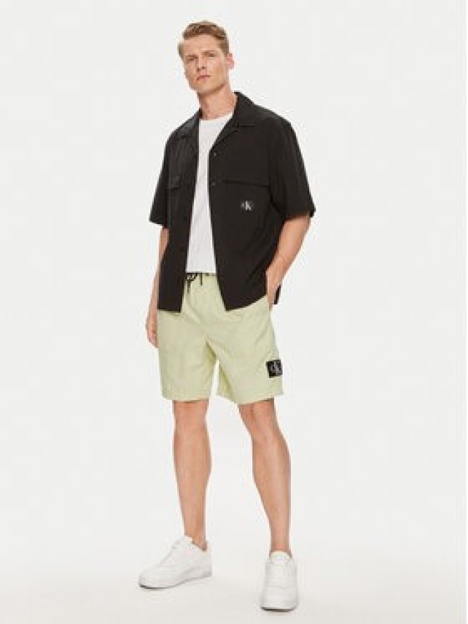 Calvin Klein Jeans Szorty materiałowe J30J325475 Zielony Regular Fit