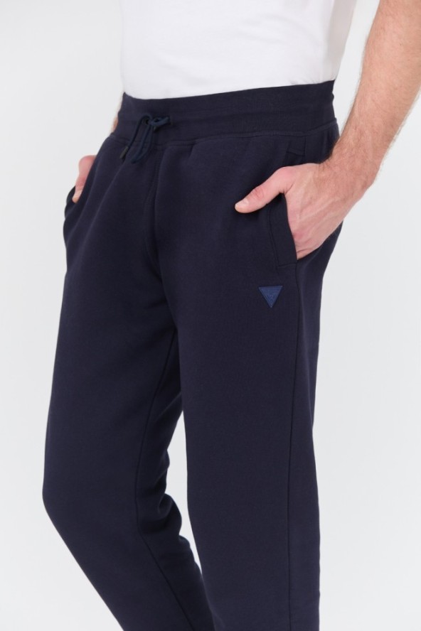 GUESS Granatowe spodnie dresowe Aldwin