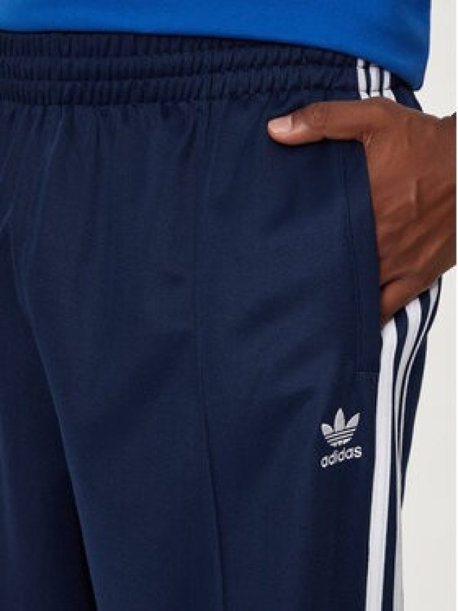 adidas Spodnie dresowe adicolor Firebird IZ2466 Granatowy Baggy Fit