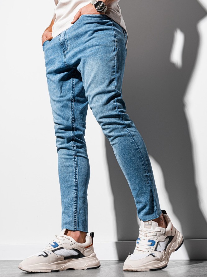Spodnie męskie jeansowe marmurkowe z surowo wykończoną nogawką SLIM FIT - jasnoniebieskie V2 OM-PADP-0146 - S