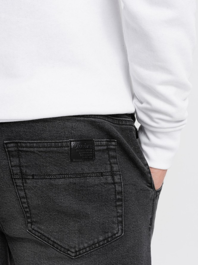 Męskie spodnie jeansowe JOGGERY z przetarciami - czarne V2 OM-PADJ-0150 - XXL