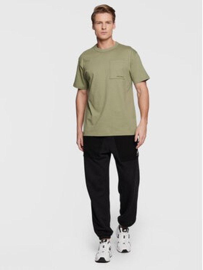 New Balance T-Shirt MT23567 Zielony Relaxed Fit