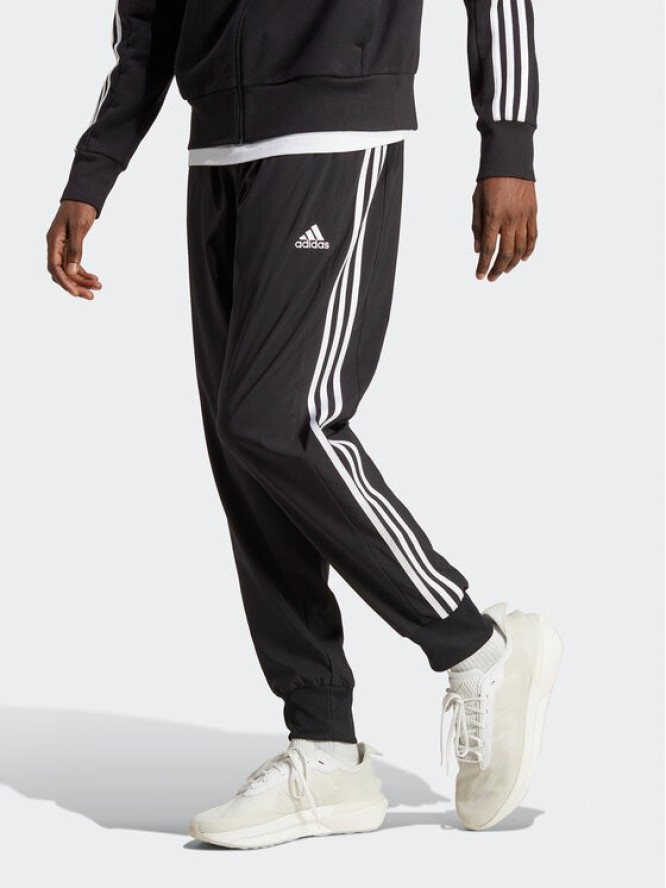 adidas Spodnie dresowe AEROREADY Essentials Tapered Cuff Woven 3-Stripes Joggers IC0041 Czarny Regular Fit