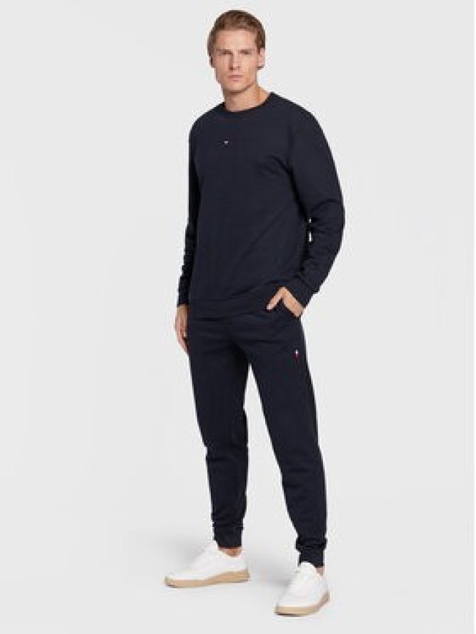 Tommy Hilfiger Spodnie dresowe UM0UM02667 Granatowy Relaxed Fit